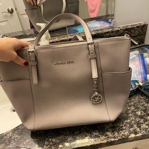 Gray and silver Michael kors tote